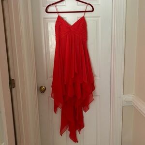 Cocktail dress with cascade skirt